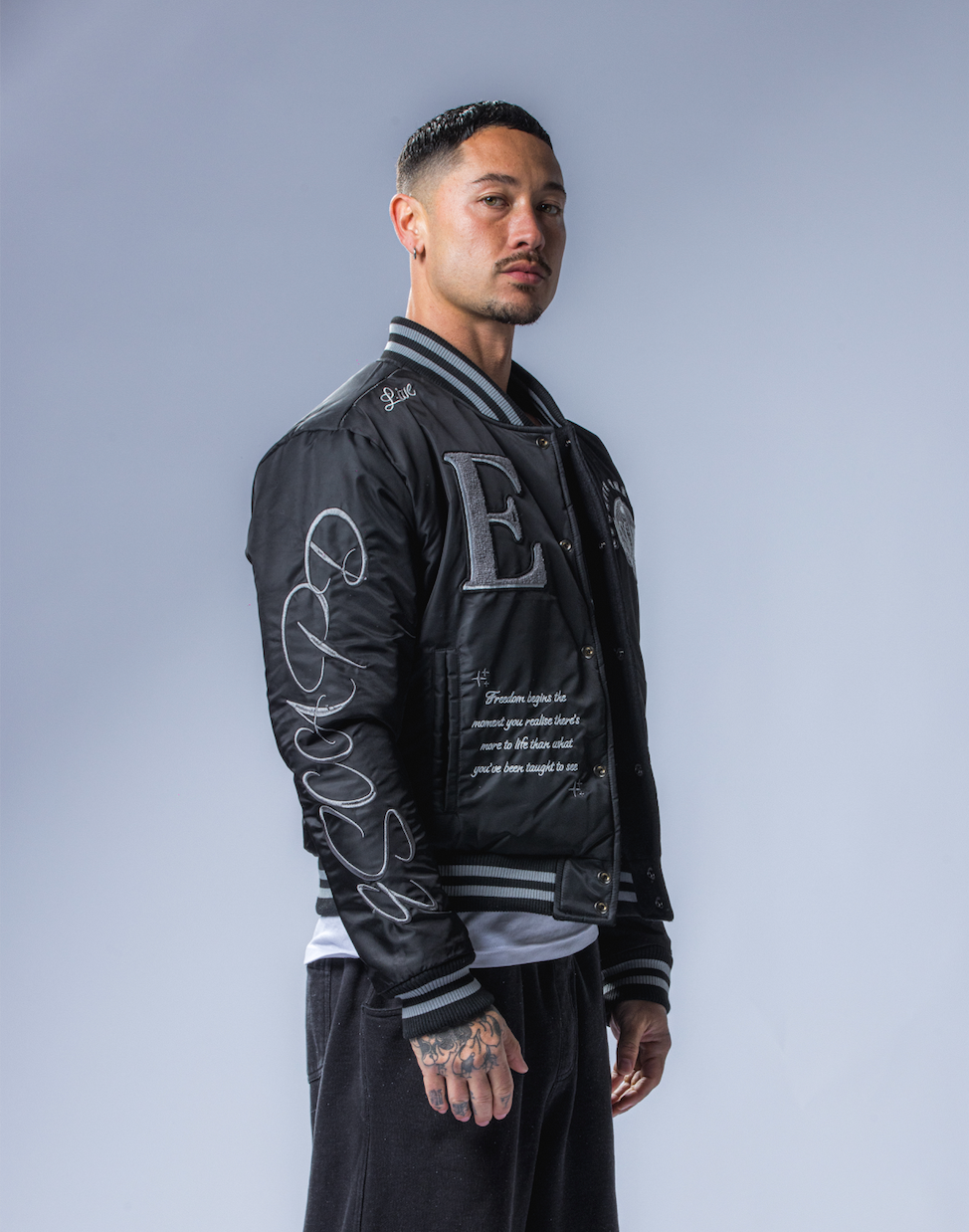 REVERSIBLE VARSITY JACKET