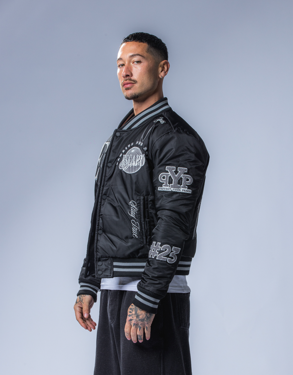 REVERSIBLE VARSITY JACKET
