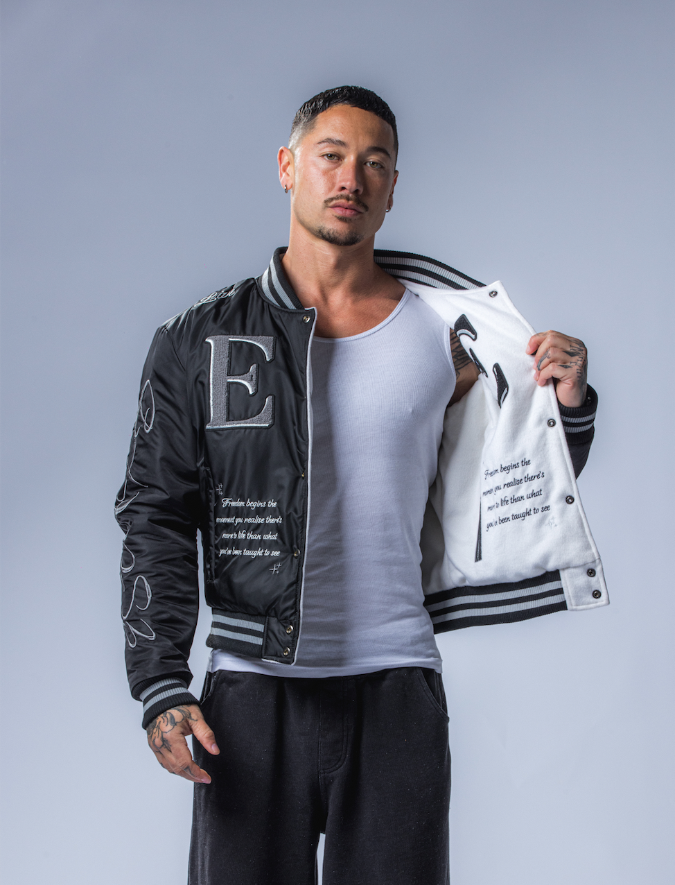 REVERSIBLE VARSITY JACKET