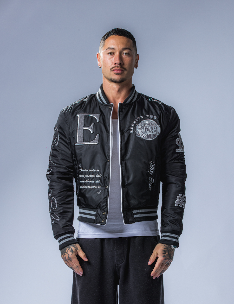 REVERSIBLE VARSITY JACKET