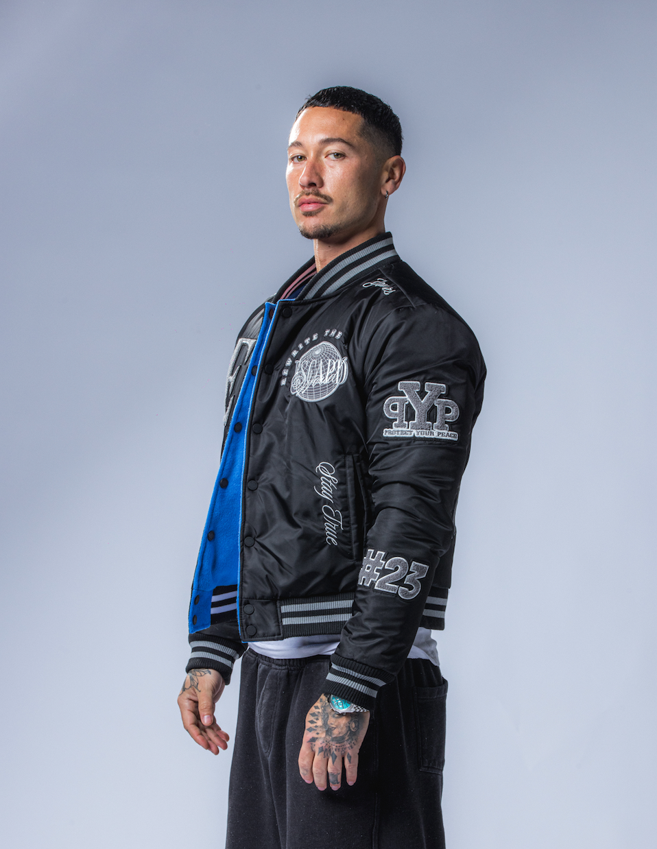 REVERSIBLE VARSITY JACKET