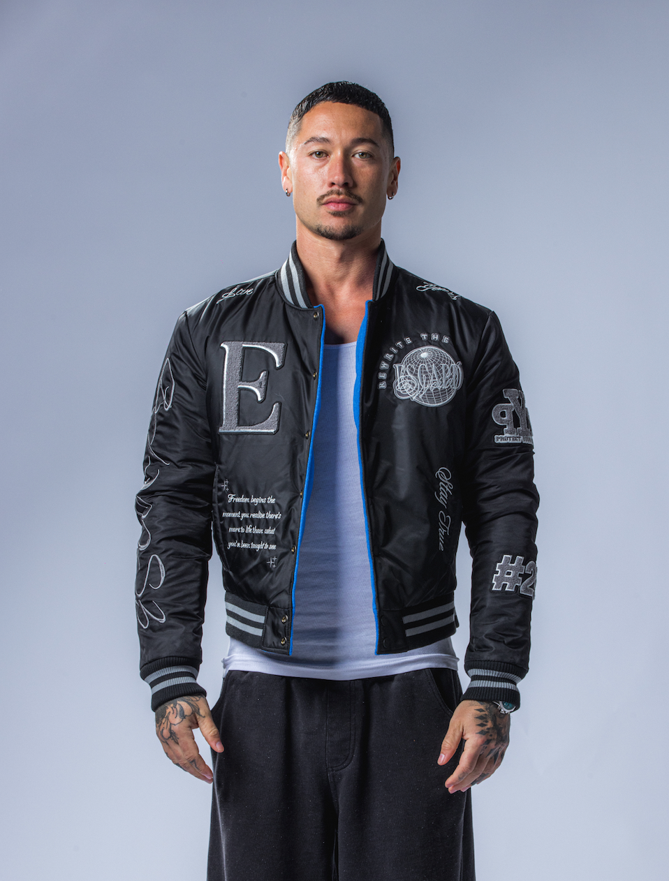 REVERSIBLE VARSITY JACKET