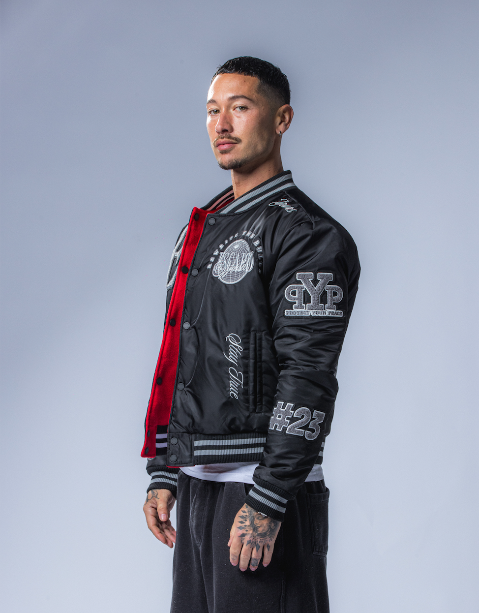 REVERSIBLE VARSITY JACKET