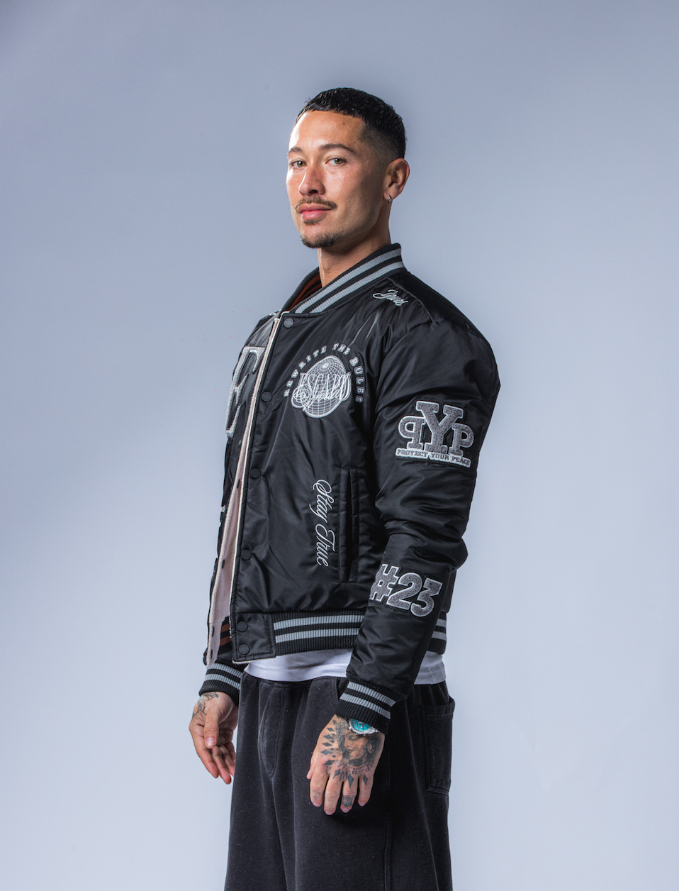 REVERSIBLE VARSITY JACKET